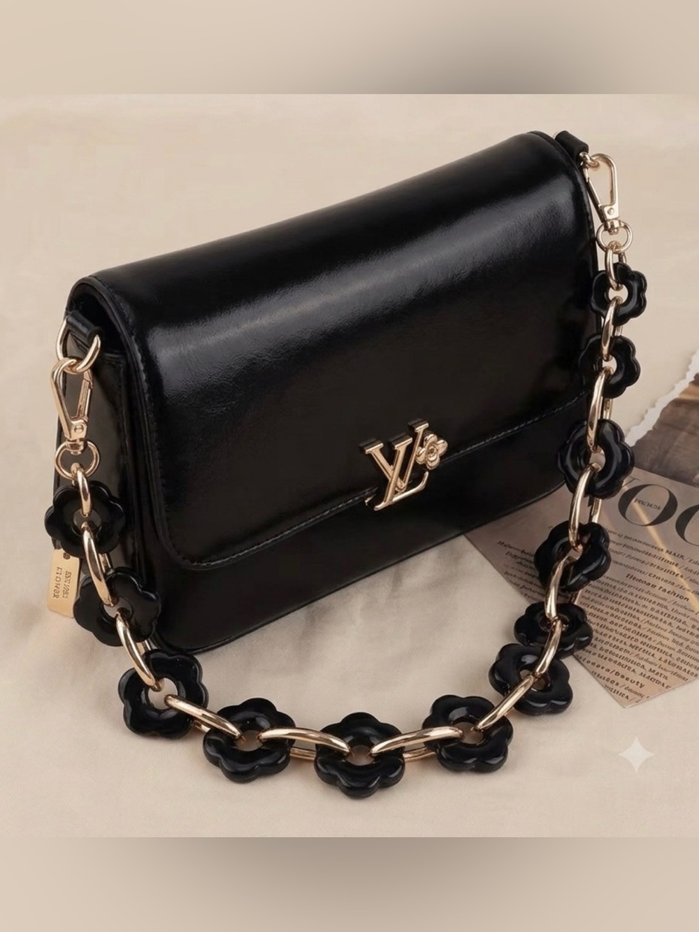NEW BLACK & GOLD Flower shaped acrylic bag chain. 23.5”
